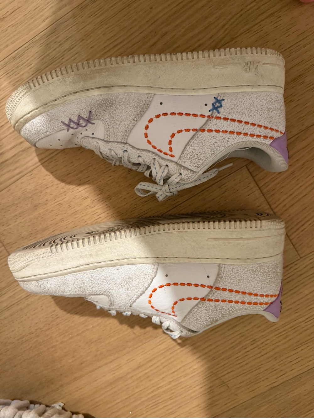 Nike White Sneakers with Orange Stitching and Purple Heel